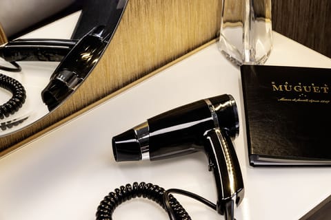 Shower, rainfall showerhead, hair dryer, towels