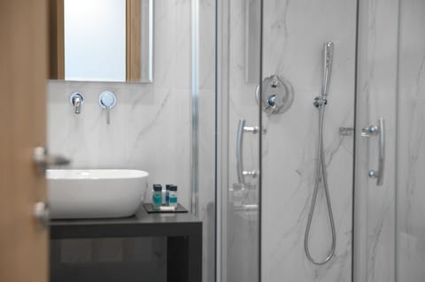 Shower, free toiletries, hair dryer, bathrobes