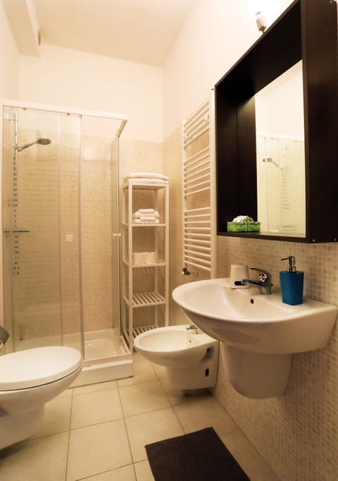 Double Room (Blu) | Bathroom | Shower, rainfall showerhead, bathrobes, bidet