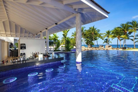 Outdoor pool, open 7:00 AM to 6:00 PM, pool umbrellas, sun loungers