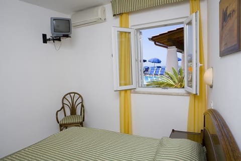 Economy Quadruple Room | In-room safe, desk, bed sheets