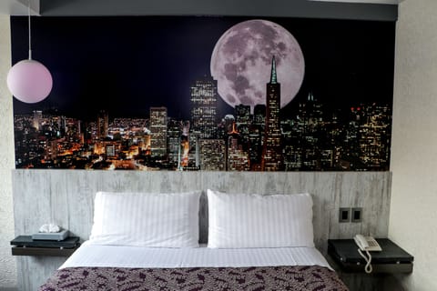 Deluxe Room, Non Smoking | In-room safe, desk, laptop workspace, blackout drapes