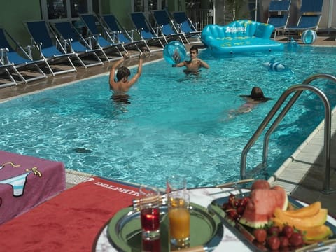 Seasonal outdoor pool, sun loungers