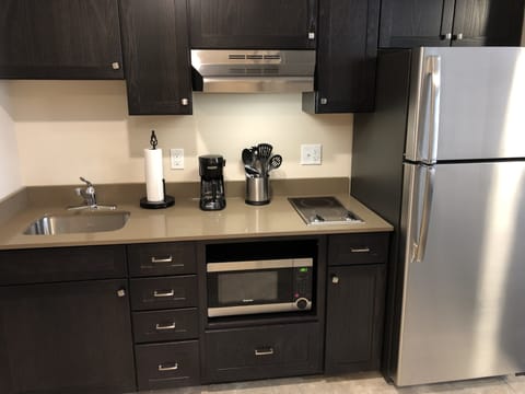 Standard King Room ADA | Private kitchenette | Full-size fridge, microwave, stovetop, coffee/tea maker