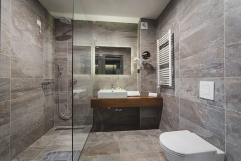 Hair dryer, towels, soap, shampoo