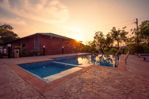 Outdoor pool, pool umbrellas, sun loungers