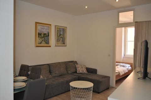 Apartment, 2 Bedrooms | Living area | Flat-screen TV