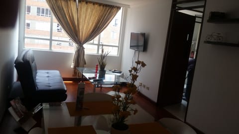 Family Apartment, 3 Bedrooms | Living room | Flat-screen TV