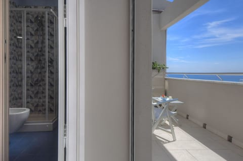 Double Room, Terrace, Sea View | Free minibar items, in-room safe, individually furnished, desk