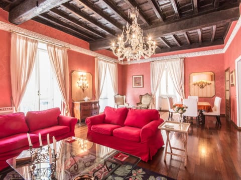 Deluxe Apartment (4 Bedrooms) | Living area | Flat-screen TV, fireplace