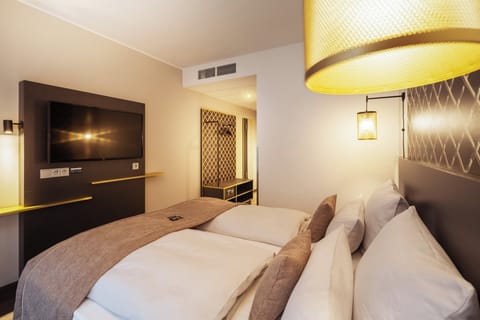 Premium bedding, in-room safe, desk, soundproofing