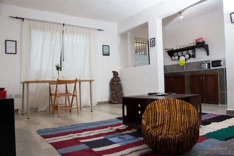 Double Room, 2 Bedrooms | Living room | Flat-screen TV