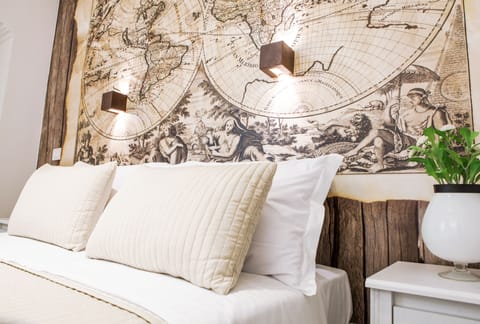 Room, Private Bathroom (Mappamondo) | Free minibar items, in-room safe, individually decorated