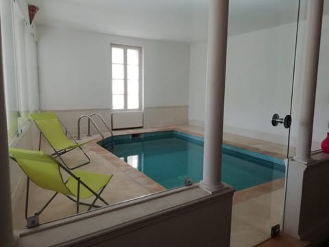 Indoor pool, sun loungers