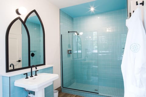 Shower, hair dryer, bathrobes, towels