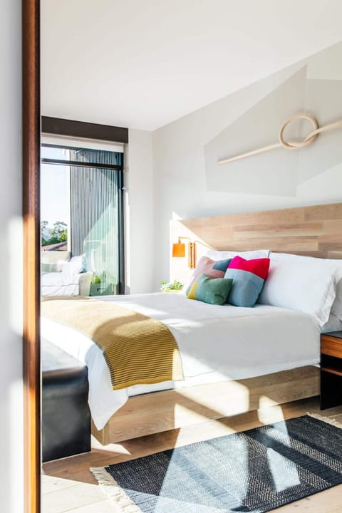 Paseo King Room | Egyptian cotton sheets, premium bedding, down comforters, pillowtop beds