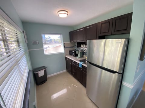 Microwave, coffee/tea maker, toaster, cookware/dishes/utensils