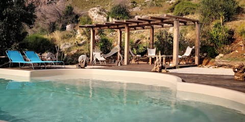 Outdoor pool, open 9:00 AM to 8:00 PM, sun loungers