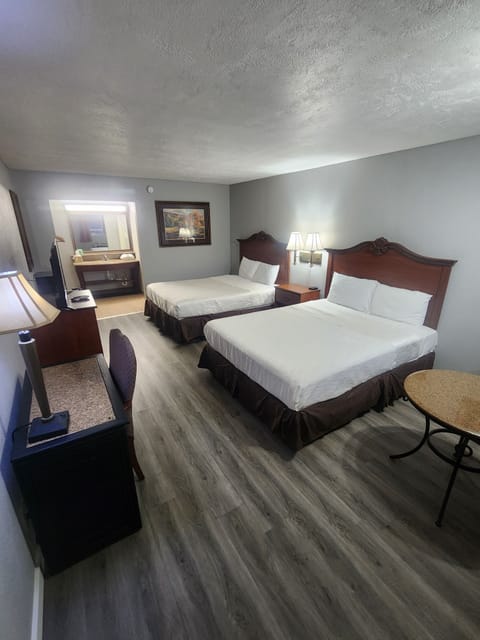 Deluxe Double Room, City View | Desk, laptop workspace, blackout drapes, free WiFi