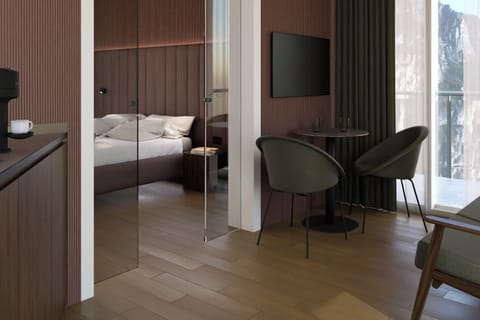 Suite, Balcony | Minibar, in-room safe, individually furnished, desk