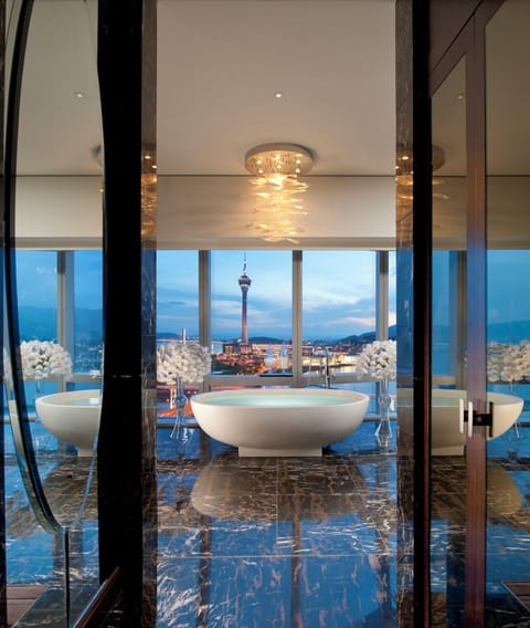 Separate tub and shower, eco-friendly toiletries, hair dryer, bathrobes