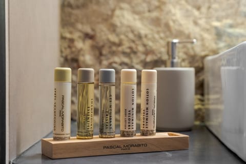 Separate tub and shower, rainfall showerhead, free toiletries