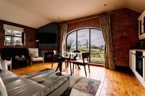 Apartment, Ensuite (The Barn- Self Catering) | Private kitchen | Highchair