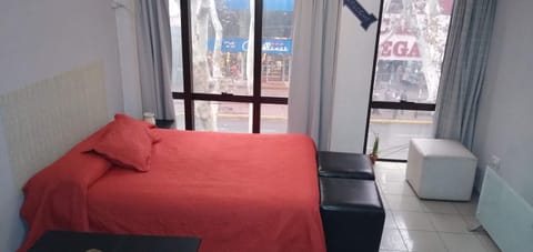 Apartment, City View (Parking) | Minibar, individually decorated, individually furnished, desk