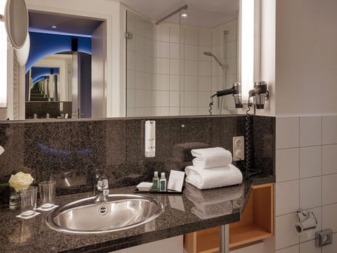 Hair dryer, towels, soap, shampoo