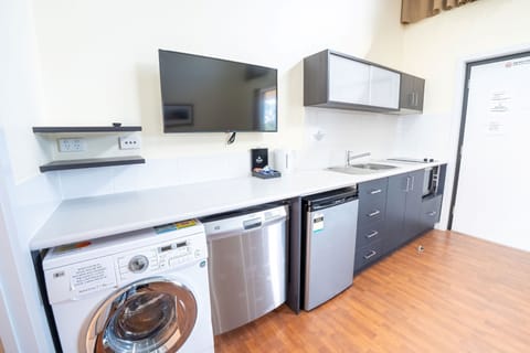 One Bedroom Apartment | Private kitchen | Mini-fridge, microwave, coffee/tea maker, electric kettle