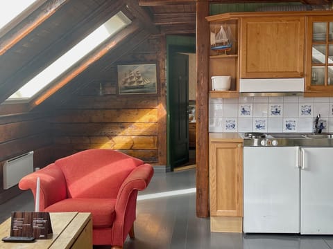 Rorbu Suite 216 | Private kitchen | Microwave, oven, stovetop, dishwasher