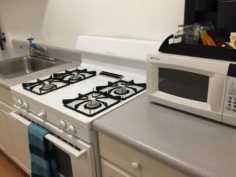 Suite, 1 King Bed (No Pets Allowed) | Private kitchen | Coffee/tea maker