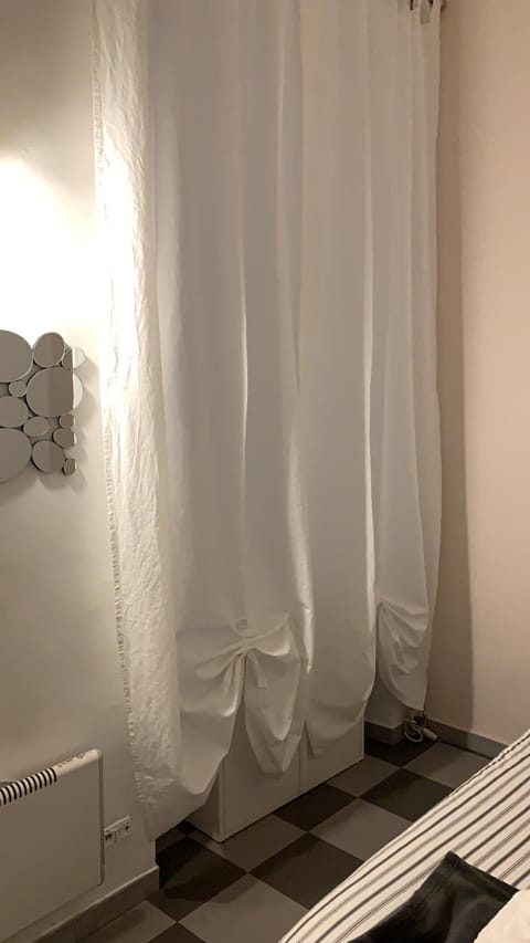 Down comforters, blackout drapes, free WiFi, bed sheets