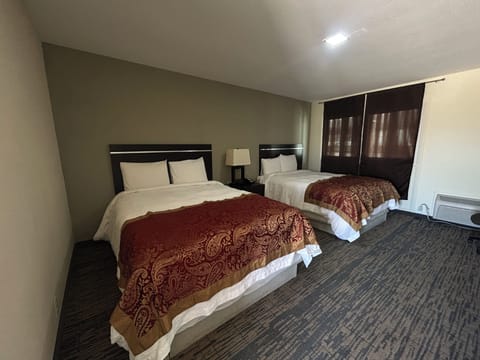 Room, 2 Queen Beds, Non Smoking | Desk, iron/ironing board, free WiFi, bed sheets