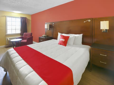 Minibar, desk, bed sheets