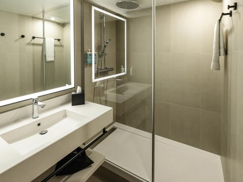 Eco-friendly toiletries, hair dryer, towels, soap