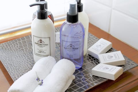 Designer toiletries, hair dryer, bathrobes, slippers