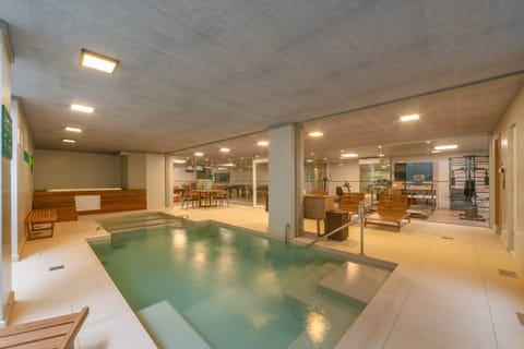 Indoor pool, open 10:00 AM to 10:00 PM, sun loungers