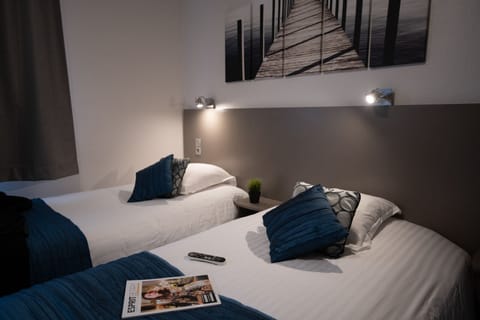 Desk, blackout drapes, iron/ironing board, free cribs/infant beds