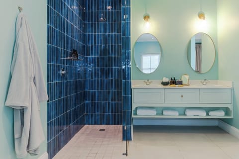 Suite, 1 King Bed, Poolside | Bathroom | Separate tub and shower, deep soaking tub, designer toiletries