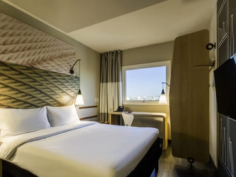 Minibar, desk, blackout drapes, soundproofing