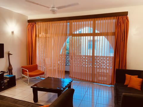 Classic Apartment, 2 Bedrooms | Living area | 42-inch LED TV with digital channels, TV, DVD player