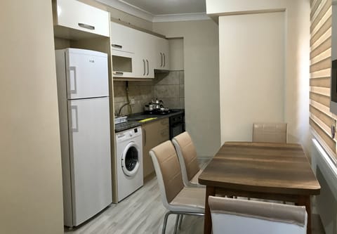 Apartment, 1 Bedroom | Private kitchenette | Full-size fridge, oven, stovetop, coffee/tea maker