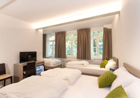 Family Room | Minibar, individually furnished, desk, laptop workspace