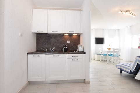 Exclusive Studio, Sea View | Private kitchen | Full-size fridge, stovetop, coffee/tea maker, electric kettle