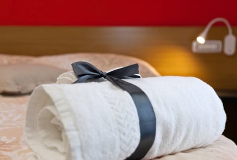 Premium bedding, down comforters, memory foam beds, desk