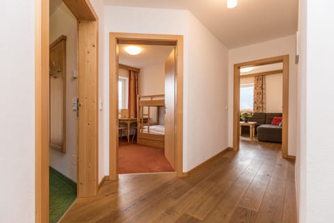 Deluxe Family Apartment | Living area | Heated floors