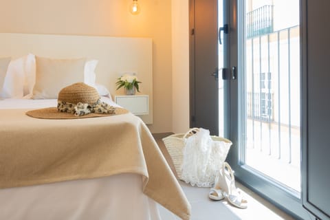 Double Room with Extra Bed | Minibar, desk, laptop workspace, blackout drapes