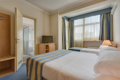 Triple Room | Select Comfort beds, minibar, in-room safe, individually furnished
