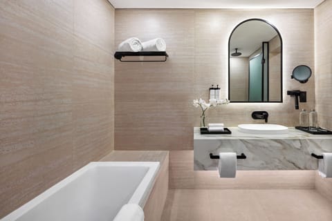 Junior Suite, Newly Renovated, Evening Drinks & Canapes Section, Free Shuttle To Public Beach | Bathroom | Separate tub and shower, free toiletries, hair dryer, bathrobes